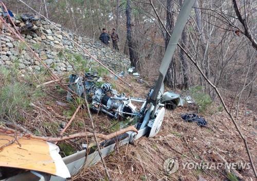 This image, provided by the Gangwon Fire Headquarters on March 15, 2023, shows the wreckage of a civilian helicopter after it crashed in Yeongwol at around 7:46 a.m. (PHOTO NOT FOR SALE) (Yonhap)
