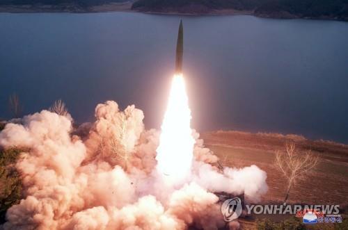 This photo, carried by North Korea's official Korean Central News Agency on March 15, 2023, shows the North firing two ground-to-ground ballistic missiles from Jangyon, South Hwanghae Province, the previous day. (For Use Only in the Republic of Korea. No Redistribution) (Yonhap)