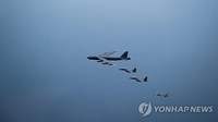(LEAD) S. Korea, U.S., Japan decry N.K.' satellite launch, arms shipments to Russia