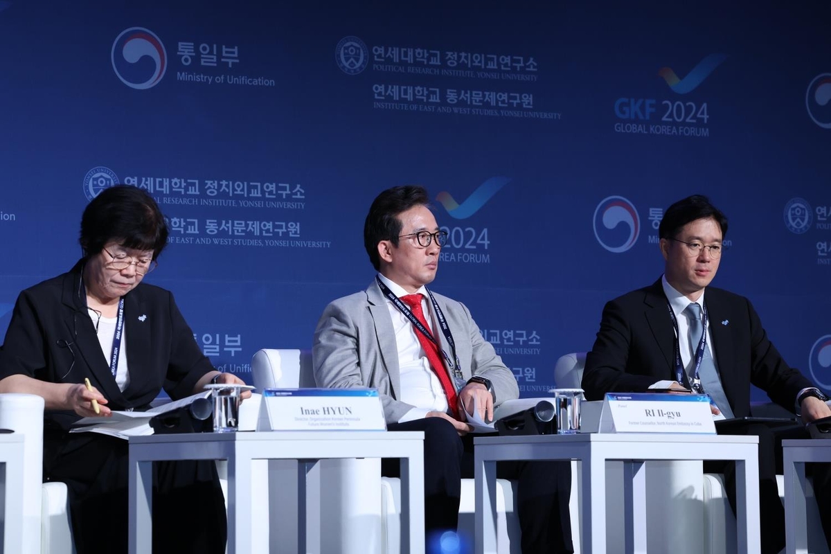 This photo, provided by South Korea's unification ministry on Sept. 3, 2024, shows Ri Il-gyu (C), a former counselor of political affairs at the North Korean Embassy in Cuba, participating in the Global Korea Forum in Seoul. (PHOTO NOT FOR SALE) (Yonhap)