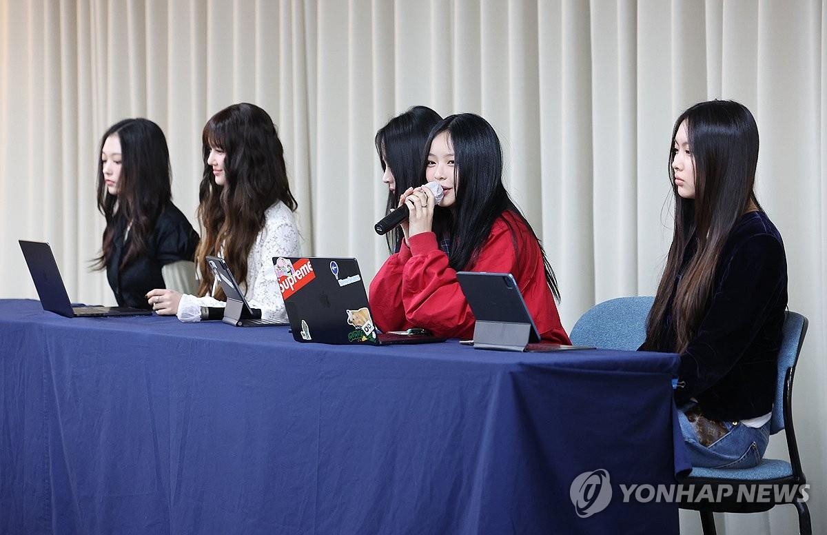 K-pop girl group NewJeans members hold a press conference in Gangnam, southern Seoul, on Nov. 28, 2024. (Pool photo) (Yonhap)