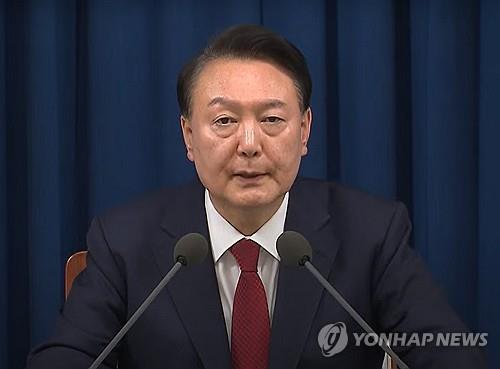 President Yoon Suk Yeol announces the lifting of a martial law decree at the presidential office in Seoul early on Dec. 4, 2024, in this photo captured from Yonhap News TV. (PHOTO NOT FOR SALE) (Yonhap)