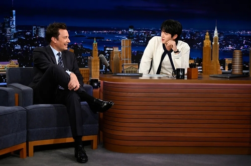 BTS' Jin (R) is seen in this photo provided by Todd Owyoung and NBC. (PHOTO NOT FOR SALE) (Yonhap)
