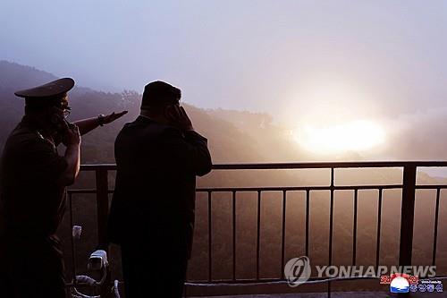 (2nd LD) N. Korea's Kim oversees test of new missile engine for ICBMs