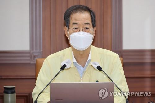 会議を主宰する韓首相＝１０日、ソウル（聯合ニュース）