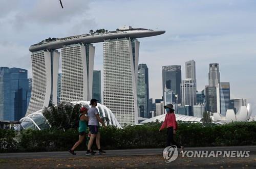 Citizens walking through Marina Bay East Park, Singapore. 2021.10.20