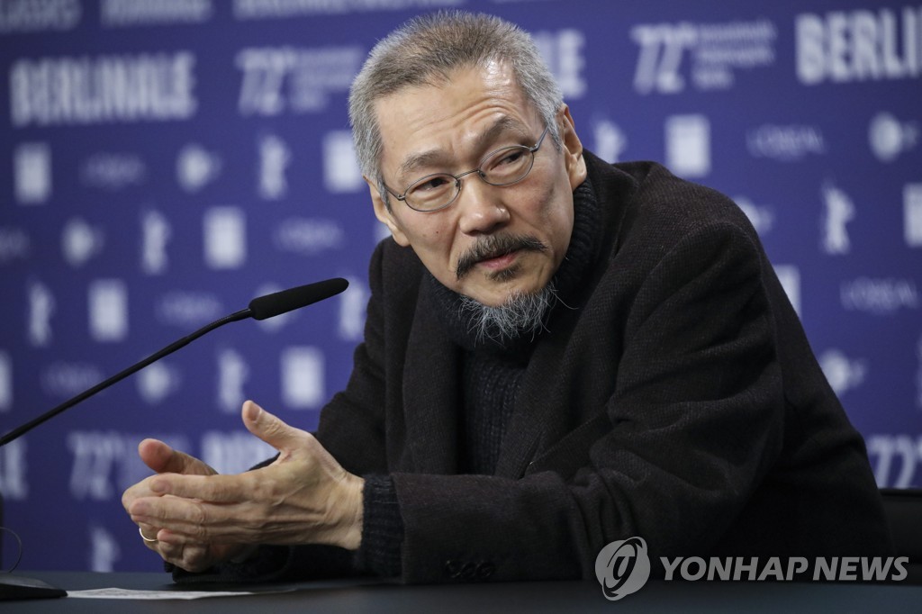In this AP photo, South Korea director Hong Sang-soo of "The Novelist's Film" speaks at a press conference during the International Film Festival Berlin in Berlin, Germany, on Feb. 16, 2022. (Yonhap)