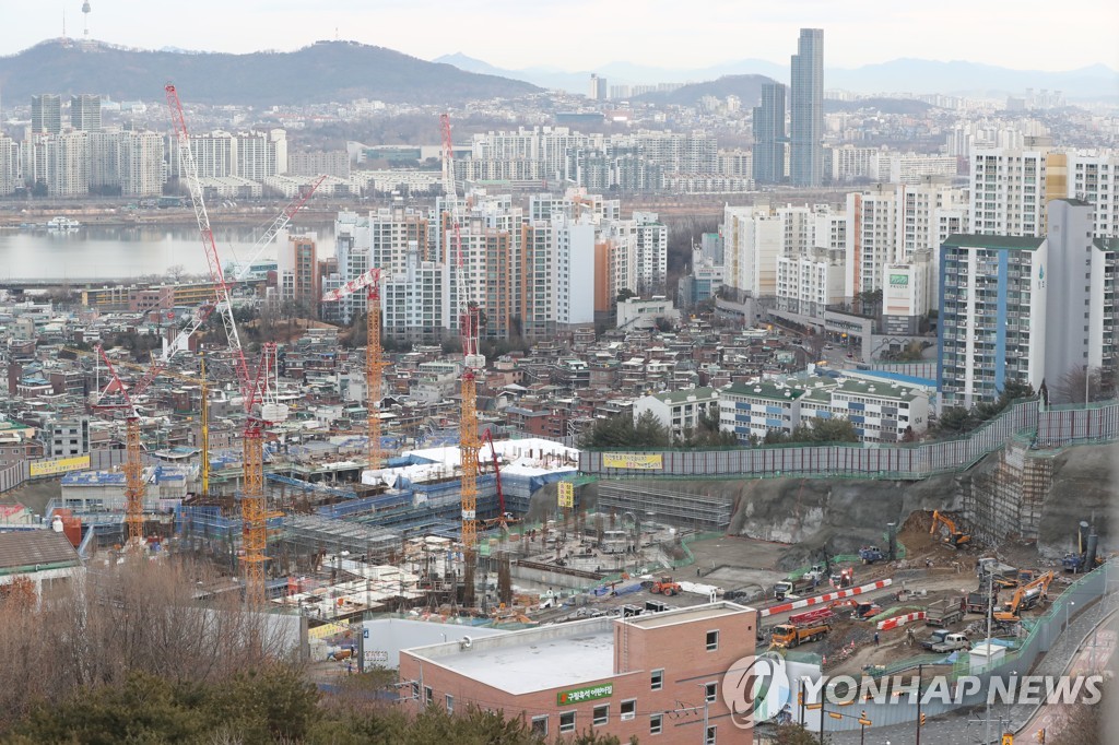 In this file photo, construction is under way in a redevelopment site in Dongjak-ward in Seoul on Feb. 12, 2021. (Yonhap)