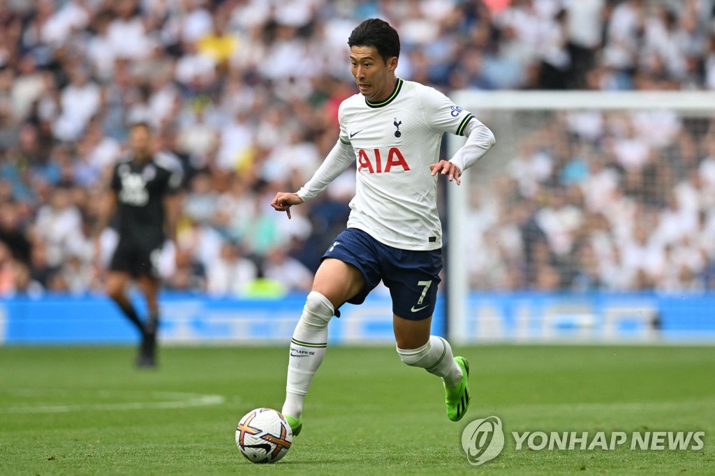 In this AFP photo, Son Heung-min of Tottenham Hotspur runs with the ball during a Premier League match against Fulham FC at Tottenham Hotspur Stadium in London on Sept. 3, 2022. (Yonhap)