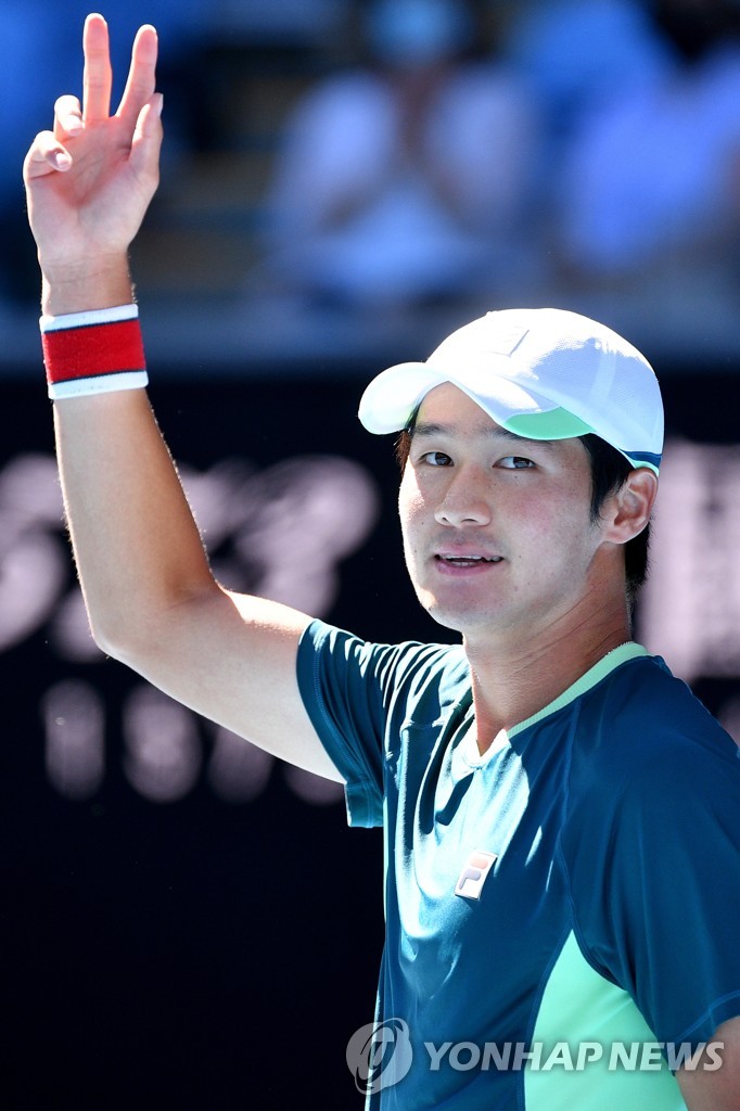 In this EPA photo, Kwon Soon-woo of South Korea celebrates a point against Denis Shapovalov of Canada during their second round men's singles match of the Australian Open at Margaret Court Arena in Melbourne on Jan. 19, 2022. (Yonhap)
