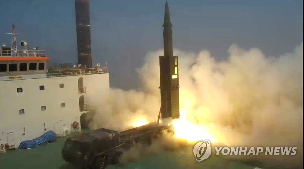 In this file photo, taken June 23, 2017, and provided by the defense ministry, Hyunmoo-2, a new home-grown ballistic missile with a range of 800 kilometers, is test-fired from a mobile launch pad at a test site of the Agency for Defense Development in Anheung, 200 kilometers southwest of Seoul, with President Moon Jae-in on hand. (PHOTO NOT FOR SALE) (Yonhap) 