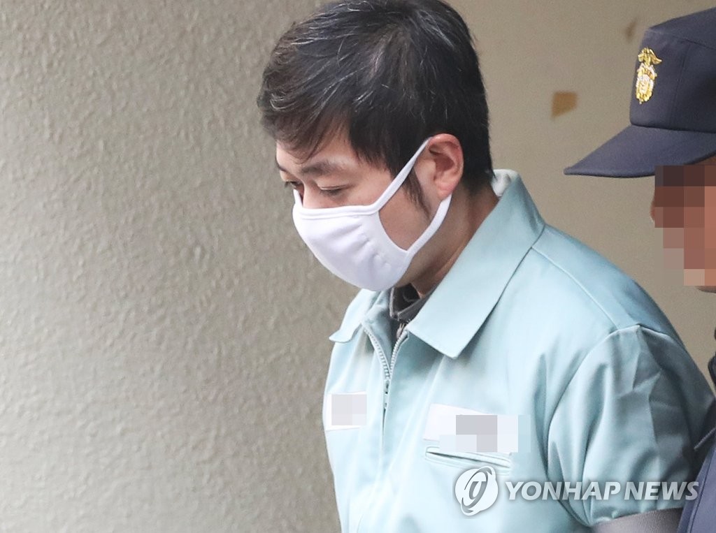 This file photo from Jan. 23, 2019, shows Cho Jae-beom, former coach of the national short track speed skating team, leaving the Suwon District Court in Suwon, 45 kilometers south of Seoul, following his appeals hearing. (Yonhap)