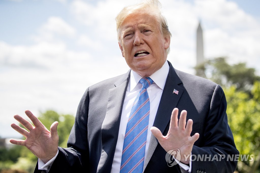 This photo, released by the Associated Press, shows U.S. President Donald Trump speaking to reporters at the White House on May 14, 2019. (Yonhap)
