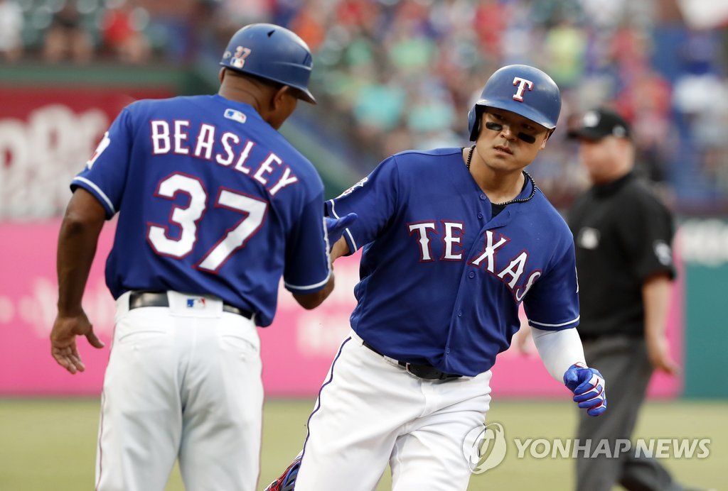 In this AP photo, Texas Rangers' outfielder Choo Shin-soo celebrates his 10th homer of the season in a game against the Kansas City Royals at Globe Life Park in Arlington, Texas, on May 30, 2019. (Yonhap)