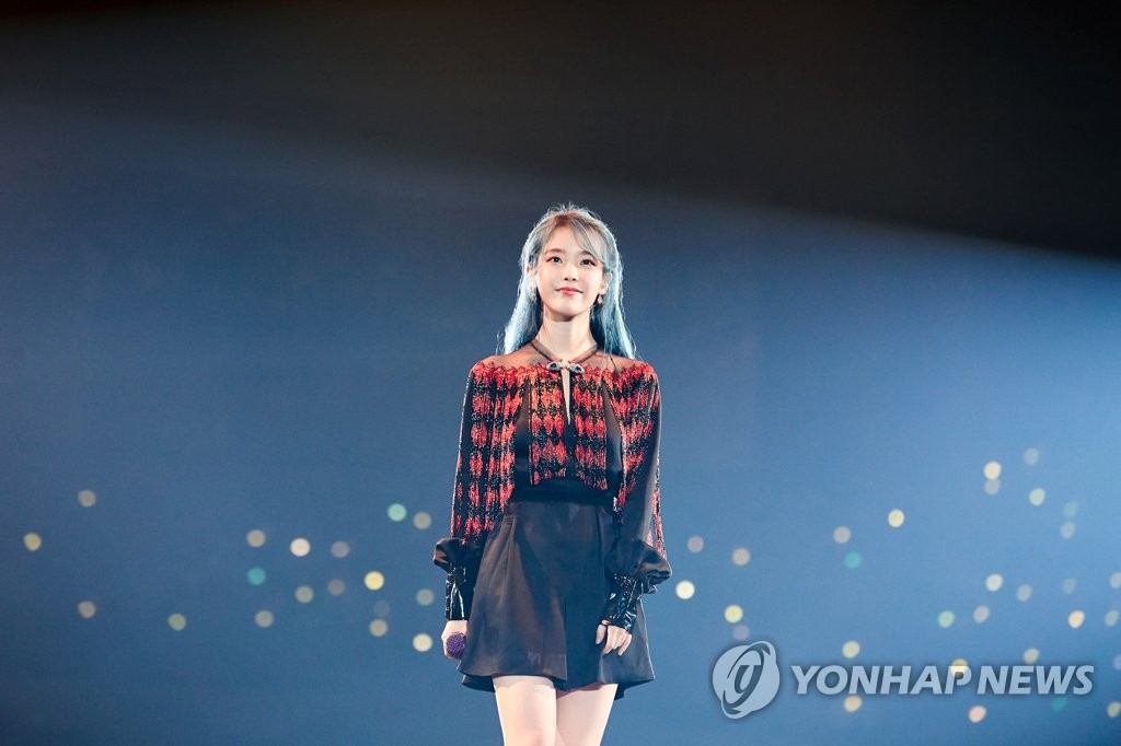 This file photo, provided by Kakao M Corp. on Dec. 31, 2019, shows K-pop songstress IU during her Asia tour. (PHOTO NOT FOR SALE) (Yonhap) 