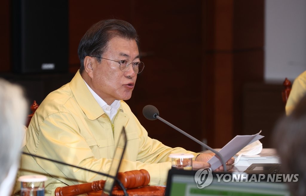 This photo, taken March 31, 2020, shows President Moon Jae-in presiding over a Cabinet meeting at the presidential office Cheong Wa Dae in Seoul. (Yonhap)