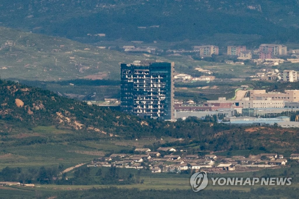 This file photo, taken from the South Korean border city of Paju on Sept. 8, 2020, shows the South Korea-built support center for the Kaesong Industrial Complex in the North Korean border town of Kaesong, which was severely damaged by the indirect impact of the North's destruction of the inter-Korean liaison office adjacent to the center in June of that year. North Korea marked the 72nd anniversary of the North Korean government's establishment the next day. (Yonhap)