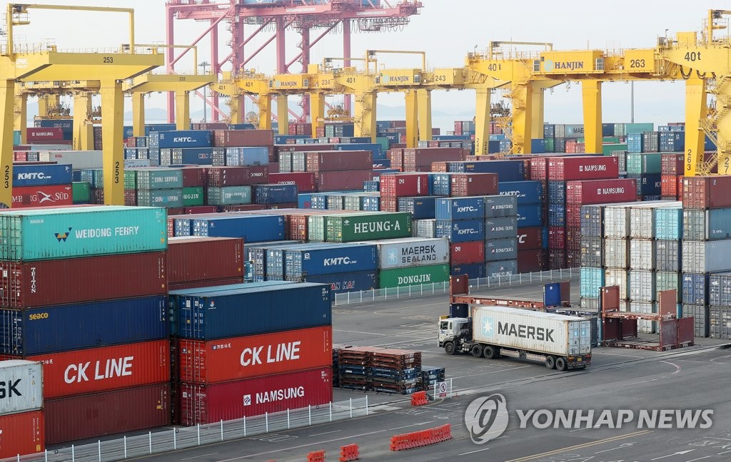 This file photo, taken Jan. 1, 2021, shows stacks of import-export cargo containers at a port of Incheon, 40 km west of Seoul. (Yonhap)