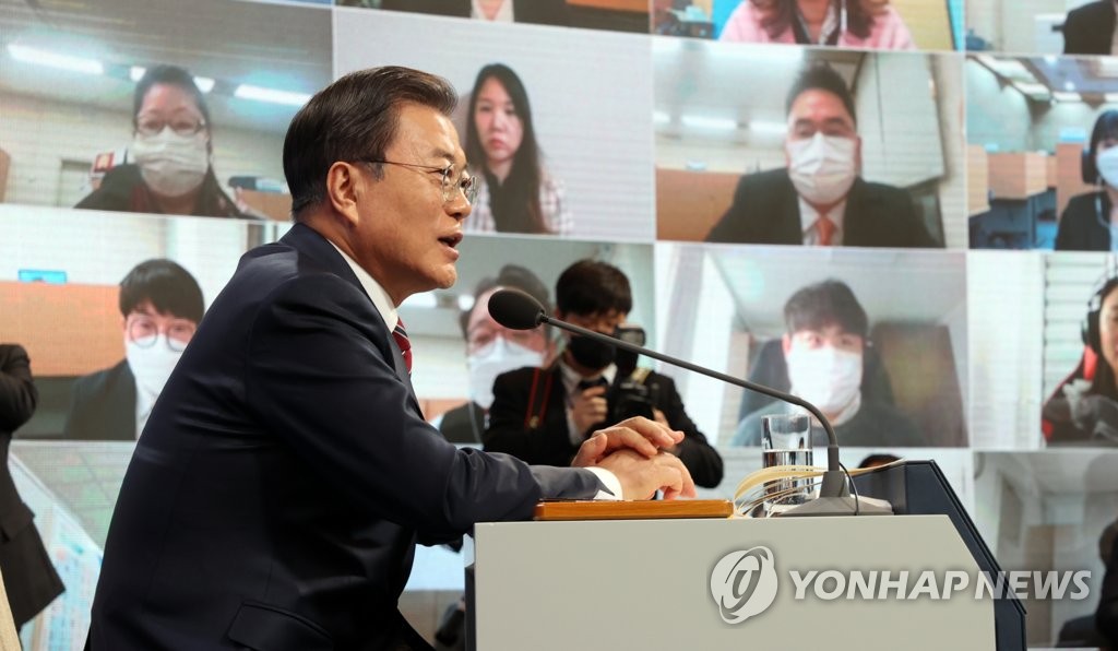President Moon Jae-in speaks during a press conference at the presidential office Cheong Wa Dae in Seoul on Jan. 18 2021, in this photo captured from a YouTube broadcast. (PHOTO NOT FOR SALE) (Yonhap)