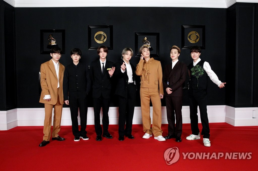 This photo, provided by Big Hit Entertainment, shows K-pop megastar BTS hitting the red carpet online as it takes part in the 63rd Grammy Awards amid the coronavirus pandemic on March 15, 2021. (PHOTO NOT FOR SALE) (Yonhap)