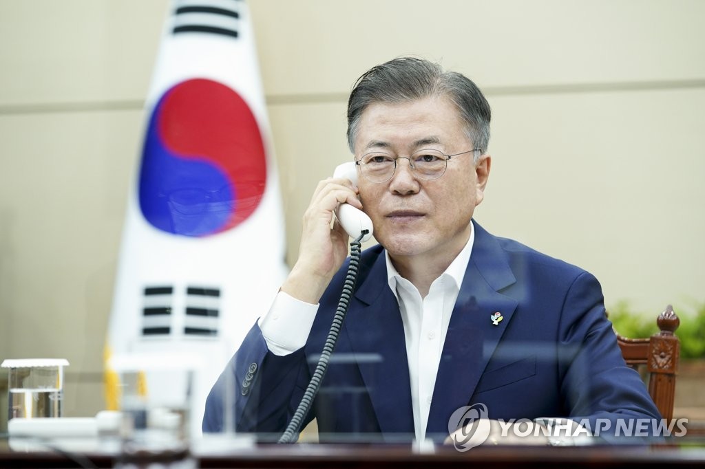South Korean President Moon Jae-in holds phone talks with British Prime Minister Boris Johnson at Cheong Wa Dae in Seoul on June 3, 2021, in this photo provided by Moon's office. (PHOTO NOT FOR SALE) (Yonhap)