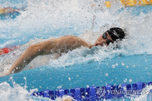 (الأولمبياد) الرئيس مون: السباح الشاب هوانغ سون-وو كتب تاريخًا جديدًا في أولمبياد طوكيو