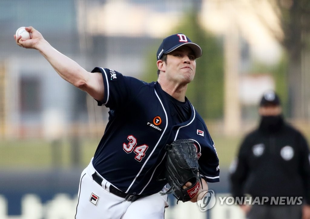 In this file photo from April 20, 2022, Robert Stock of the Doosan Bears pitches against the Kia Tigers during the bottom of the first inning of a Korea Baseball Organization regular season game at Gwangju-Kia Champions Field in Gwangju, 330 kilometers south of Seoul. (Yonhap)