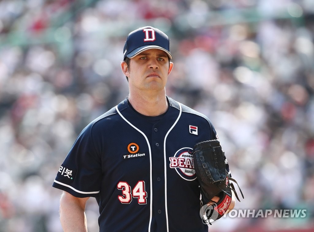 In this file photo from May 1, 2022, Doosan Bears starting pitcher Robert Stock returns to the dugout after retiring the side in the bottom of the sixth inning of a Korea Baseball Organization regular season game against the SSG Landers at Incheon SSG Landers Field in Incheon, 40 kilometers west of Seoul. (Yonhap)