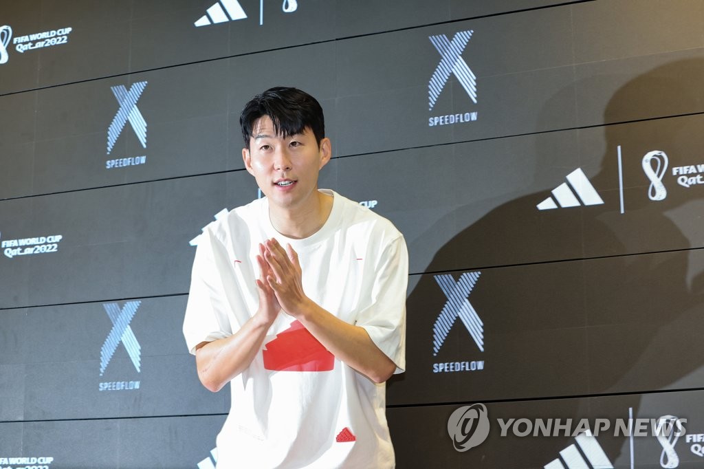 South Korean football star Son Heung-min speaks to reporters during a corporate event in Seoul on July 4, 2022. (Yonhap)