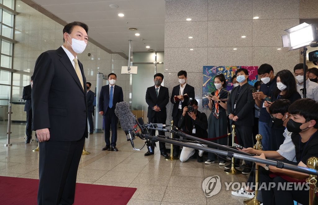 President Yoon Suk-yeol takes reporters' questions as he arrives at the presidential office in Seoul on Sept. 2, 2022. (Yonhap)