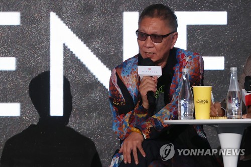 Japanese filmmaker Takashi Miike talks about his first Korean drama series "Connect" to be streamed on Disney+, during the "Open Talk" session of the 27th Busan International Film Festival held at the Busan Cinema Center in the southeastern port city on Oct. 6, 2022. (Yonhap)