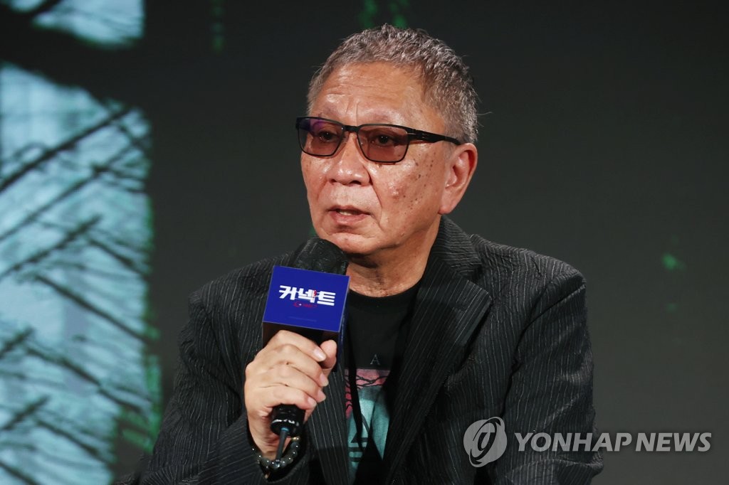 Japanese director Takashi Miike talks about his upcoming Disney+ Korean drama series "Connect" during a press conference in Busan on Oct. 7, 2022, (Yonhap)
