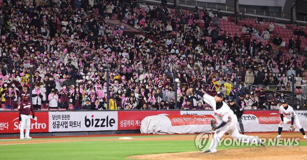 Fans at KT Wiz Park in Suwon, 35 kilometers south of Seoul, take in Game 3 of the first round in the Korea Baseball Organization postseason between the home team KT Wiz and the Kiwoom Heroes on Oct. 19, 2022. (Yonhap)