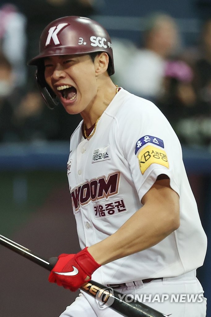 Song Sung-mun of the Kiwoom Heroes celebrates his two-run home run against the KT Wiz during the bottom of the fourth inning of Game 5 of the first round in the Korea Baseball Organization postseason at Gocheok Sky Dome in Seoul on Oct. 22, 2022. (Yonhap)