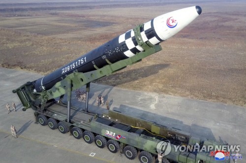 A new type of the Hwasong-17 intercontinental ballistic missile (ICBM) is loaded on a transporter erector launcher during the launch of the missile at Pyongyang International Airport on Nov. 18, 2022, in this photo released by the North's official Korean Central News Agency. (For Use Only in the Republic of Korea. No Redistribution) (Yonhap)