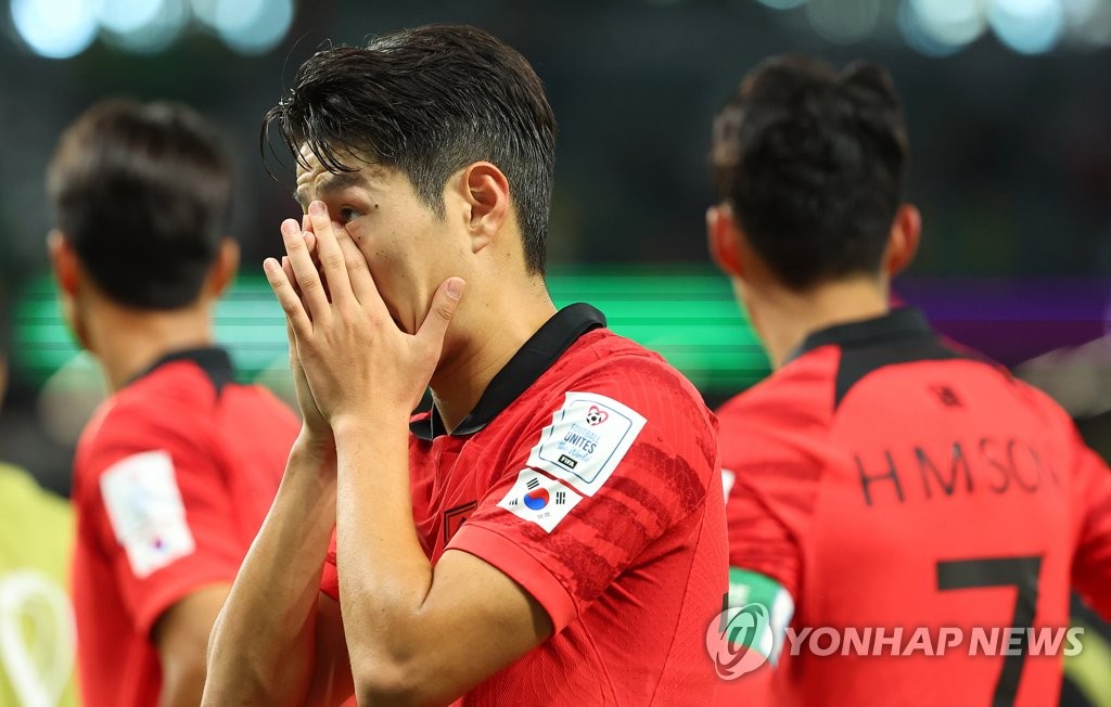 Lee Kang-in of South Korea reacts to a 3-2 loss to Ghana in the teams' Group H match at the FIFA World Cup at Education City Stadium in Al Rayyan, west of Doha, on Nov. 28, 2022. (Yonhap)
