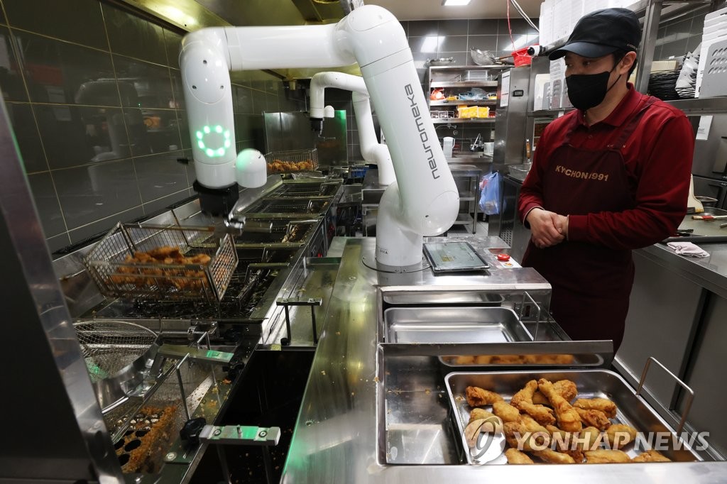 Robots make fried chicken