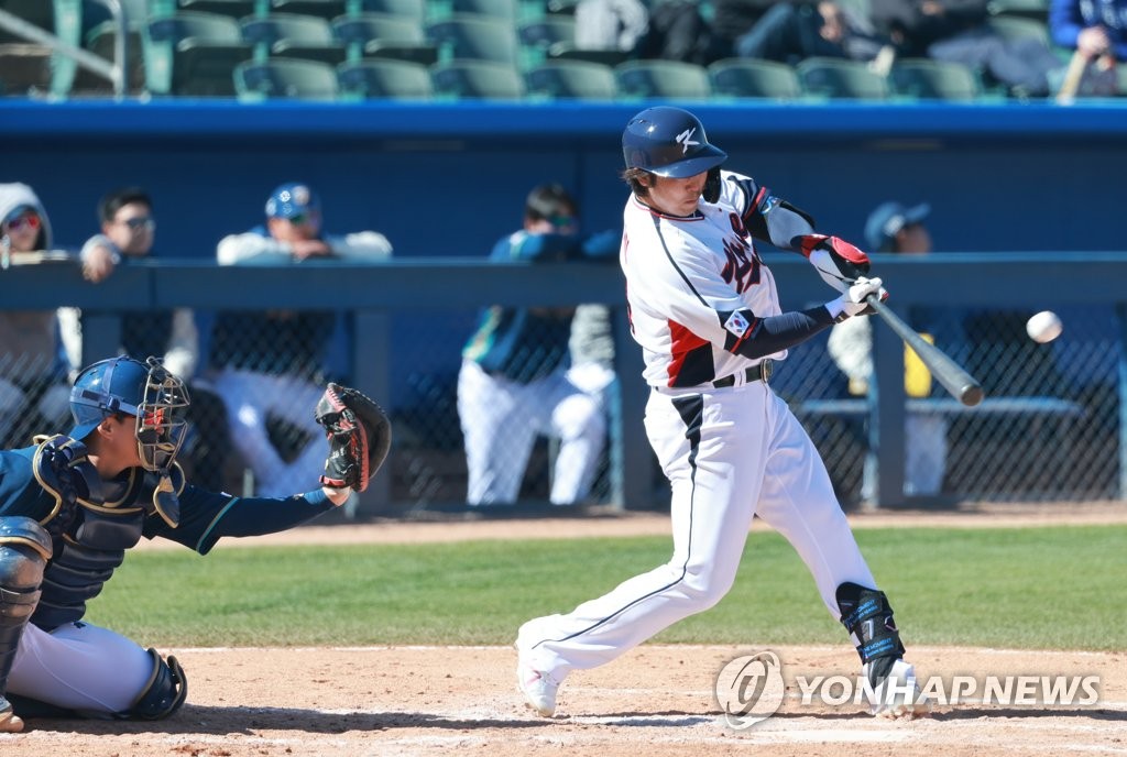 Choi Jeong of South Korea hits a solo home run against the NC Dinos during a scrimmage for the World Baseball Classic at Kino Veterans Memorial Stadium in Tucson, Arizona, on Feb. 16, 2023. (Yonhap)