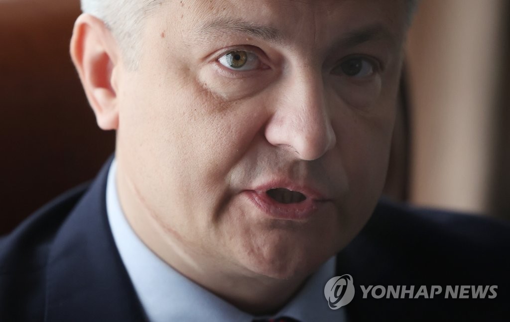 Ukrainian Ambassador to South Korea Dmytro Ponomarenko speaks during an interview with Yonhap News Agency at the Ukrainian Embassy in Seoul on Feb. 21, 2023, as the Russian invasion of Kyiv marks its first anniversary on Feb. 24. (Yonhap)