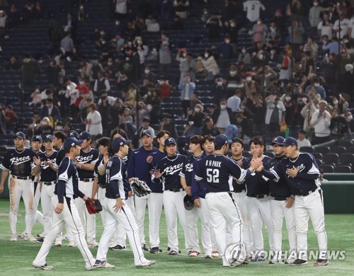 South Korean players celebrate their 22-2 victory over China in a Pool B game at the World Baseball Classic at Tokyo Dome in Tokyo on March 13, 2023. (Yonhap)