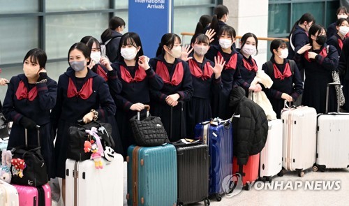 Estudiantes japoneses en su viaje escolar en Corea del Sur