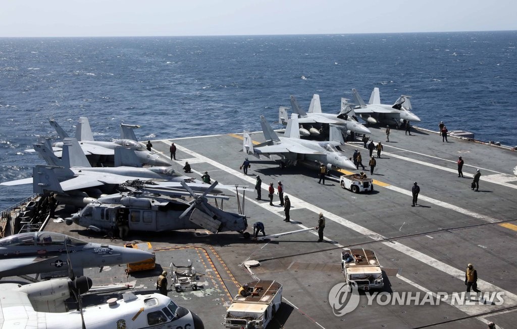 La foto de archivo, tomada el 27 de marzo de 2022, muestra la cubierta de vuelo del portaaviones USS Nimitz, mientras se realizan ejercicios con la Armada surcoreana en aguas al sur de la península coreana. (Foto del cuerpo de prensa. Prohibida su reventa y archivo)