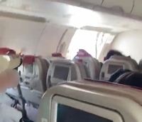 韓国・アシアナ旅客機　上空でドア開く＝恐怖におびえながら乗客着陸