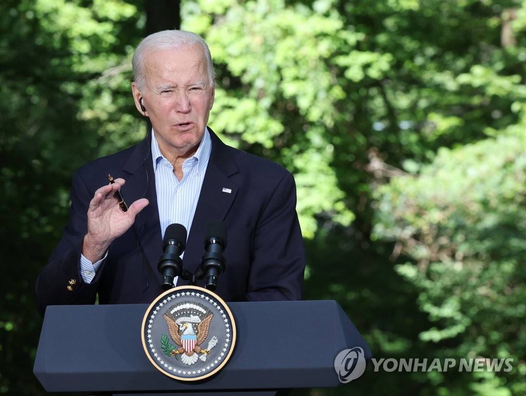 U.S. President Joe Biden speaks during a joint press conference with his South Korean and Japanese counterparts, Yoon Suk Yeol and Fumio Kishida, at Camp David in Maryland on Aug. 18, 2023. (Yonhap)