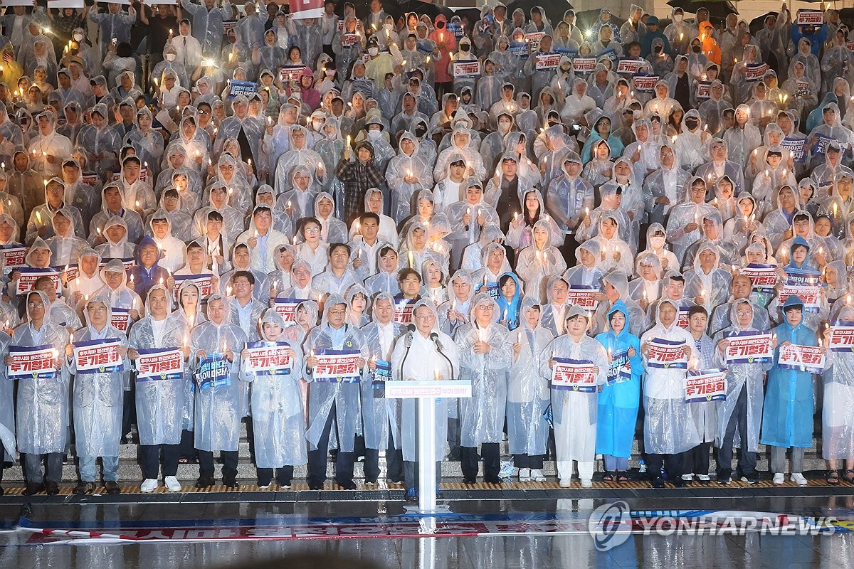 「海洋放出の撤回を」　最大野党がろうそく集会