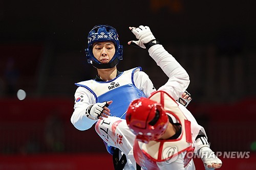  Jang Jun wins gold in men's -58kg taekwondo at Hangzhou