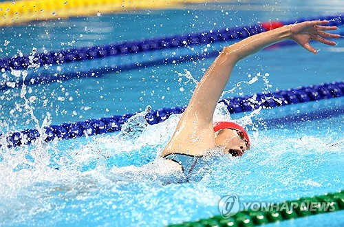 Swimming: N. Korean swimmer competes in 100m freestyle