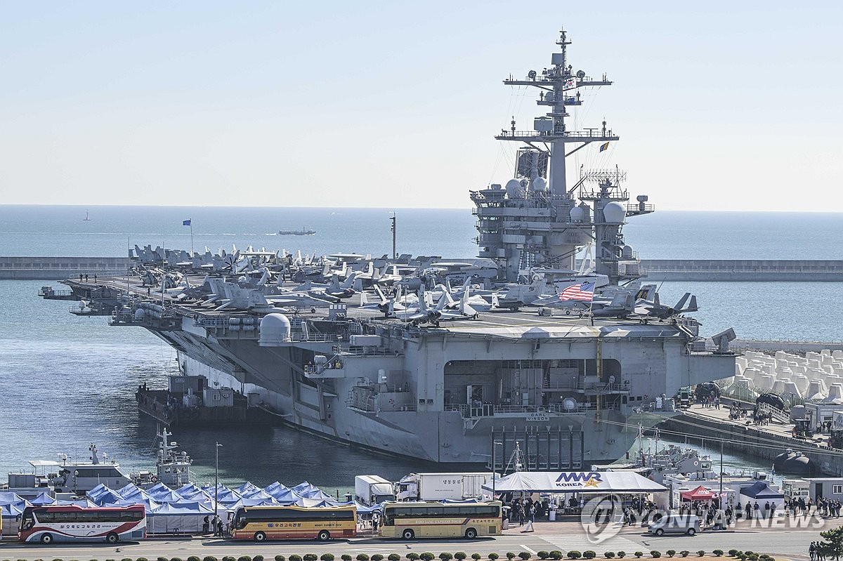 The nuclear-powered aircraft carrier USS Carl Vinson docks at a port in the southeastern port city of Busan on Nov. 21, 2023. (Yonhap)
