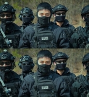 V de BTS vestido con traje antiterrorista