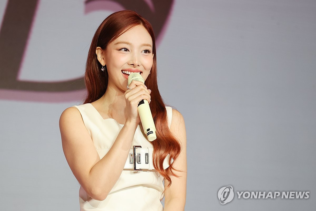 Nayeon, a member of K-pop girl group TWICE, speaks during a press conference to promote her second solo album "Na" at a Seoul hotel on June 13, 2024. The EP is slated for release on June 14 at 1 p.m. (Korean time). (Yonhap)